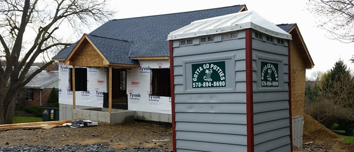 NEPA construction site toilet rentals a photo of a Gotta Go Potties portable toilet at a construction site in the Pocono area
